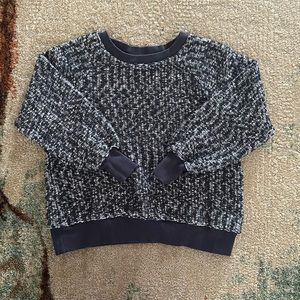 White and gray/blue sweater